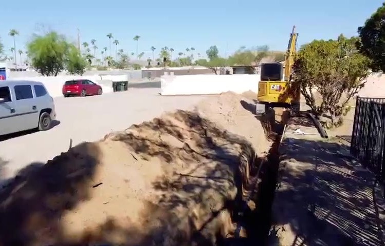 Desert Water crew excavating for a sewer line repair
