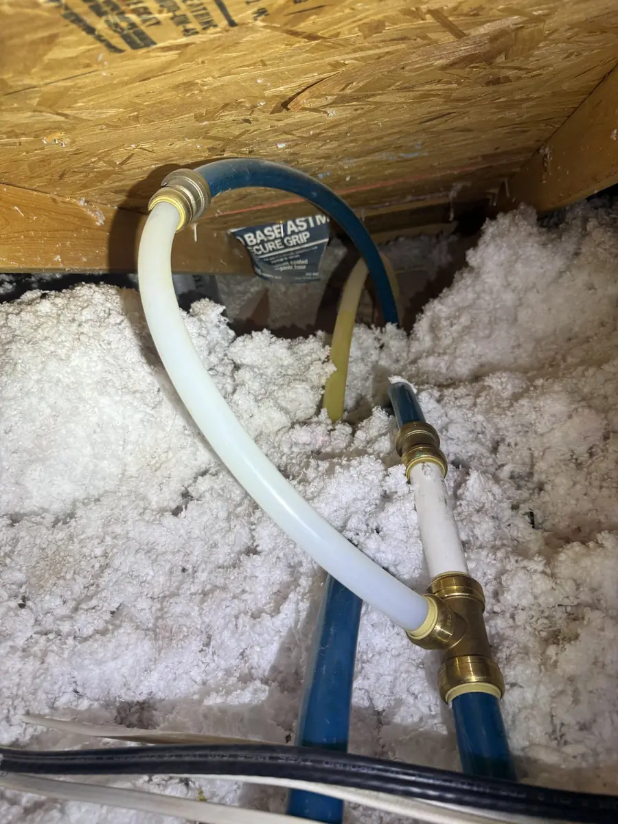 Slab leak fixed with an overhead PEX reroute in the attic